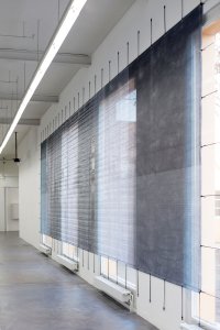<p><em>(sic)</em>, 2013<br />
mesh tarpaulin, digital print<br />
300 × 1200 cm<br />
Kunsthaus Baselland, Muttenz, CH</p>